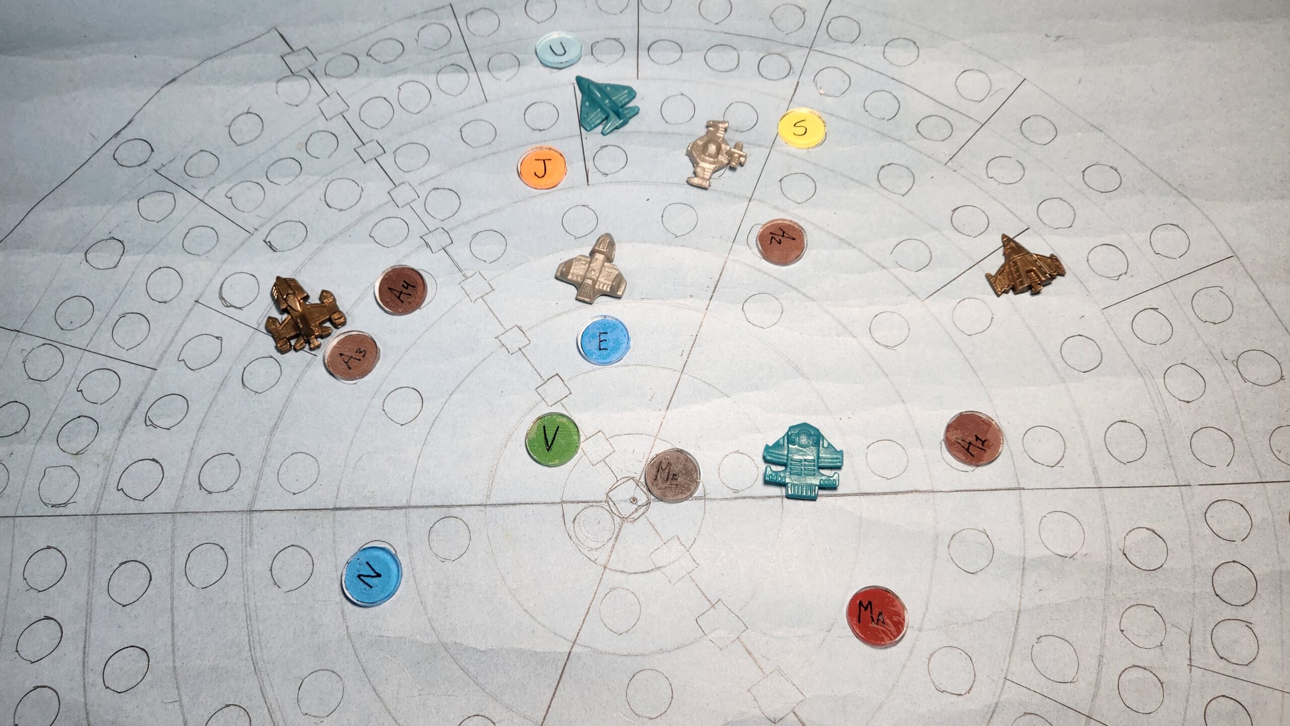 A map of the solar system for a board game with planet and spaceship tokens.